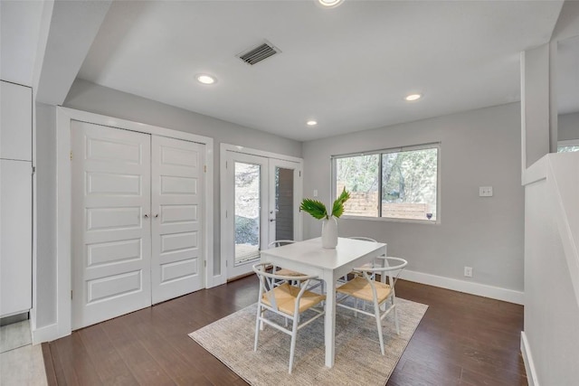 3510 Oak Springs Dr, Austin, TX 78721 - dining area featuring wood finished floors, recessed lighting, and french doors