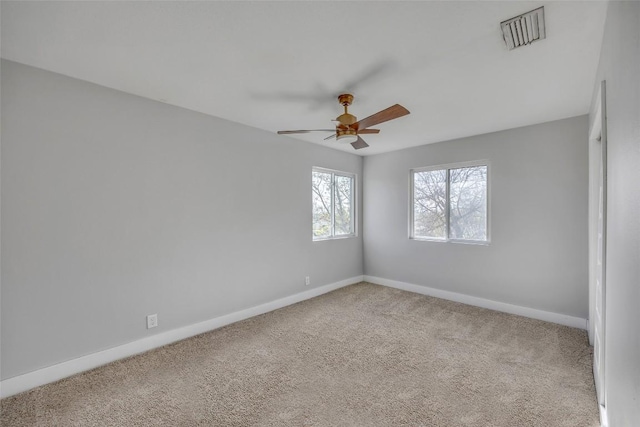 3510 Oak Springs Dr, Austin, TX 78721 - carpeted spare room with ceiling fan and baseboards