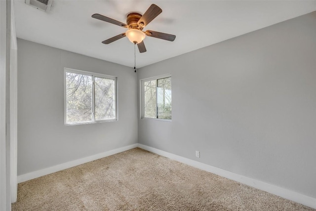 3510 Oak Springs Dr, Austin, TX 78721 - unfurnished room with carpet and a ceiling fan