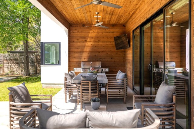 view of patio / terrace featuring outdoor dining space, ceiling fan, an outdoor hangout area, and a grill