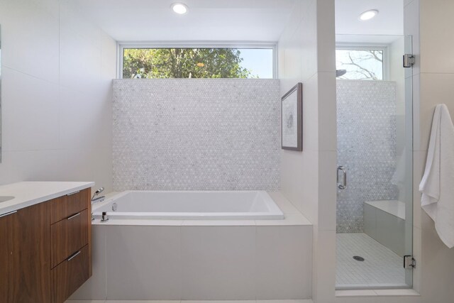 3201 Sunny Ln, Austin, TX 78731 - bathroom with a bath, a stall shower, and vanity