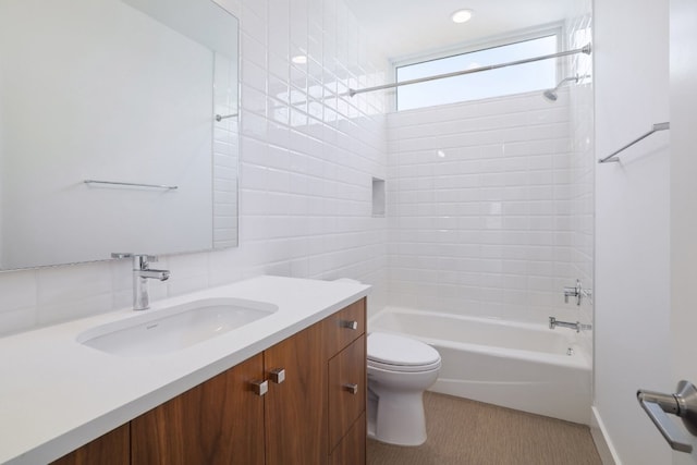 full bathroom featuring toilet, shower / washtub combination, and vanity