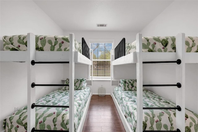 5898 River Oaks Dr, Kingsland, TX 78639 - bedroom with visible vents and dark wood-type flooring