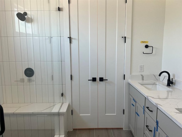 1703 Kit Cir, Austin, TX 78758 - full bathroom featuring tiled shower and double vanity