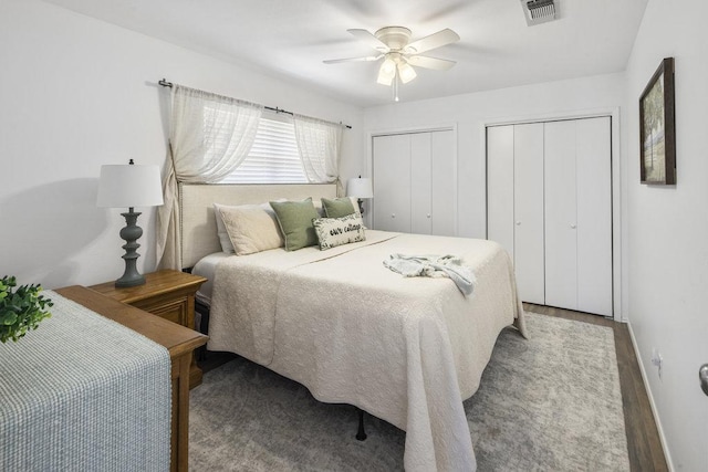 2546 Williams Lakeshore, Kingsland, TX 78639 - bedroom with multiple closets, ceiling fan, and wood finished floors