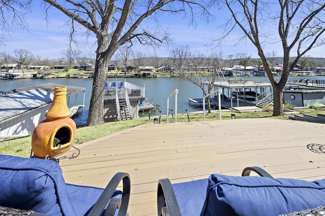 2546 Williams Lakeshore, Kingsland, TX 78639 - wooden terrace featuring a water view and a dock