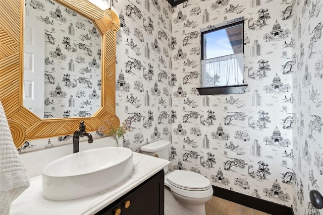 204 Ringtail Stream Dr, Lakeway, TX 78738 - bathroom featuring wallpapered walls, wood finished floors, vanity, and toilet