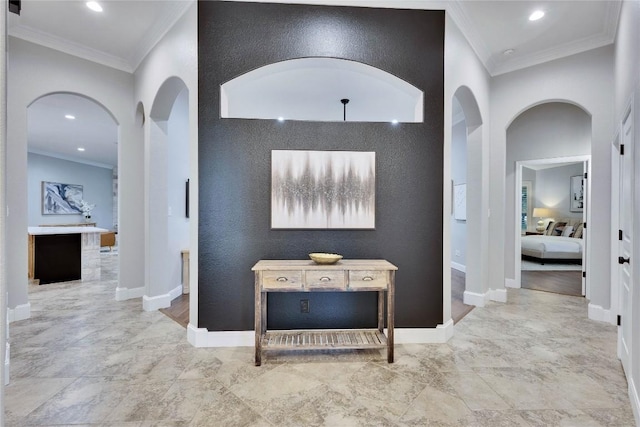 104 Standing Oak Dr, Georgetown, TX 78633 - corridor featuring ornamental molding, recessed lighting, arched walkways, baseboards, and an accent wall
