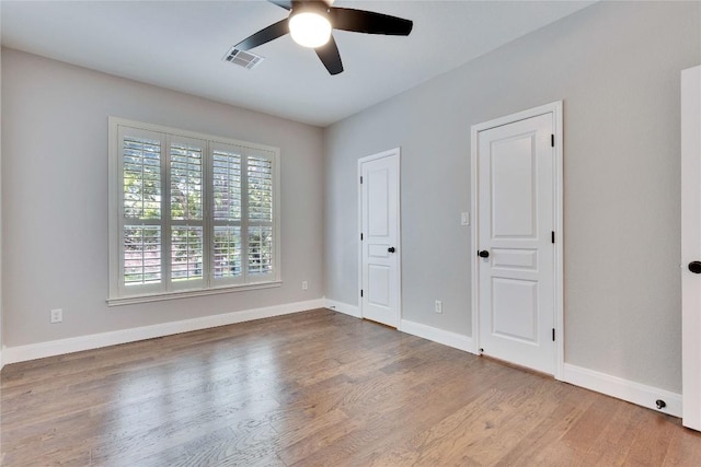 104 Standing Oak Dr, Georgetown, TX 78633 - unfurnished bedroom with wood finished floors and ceiling fan