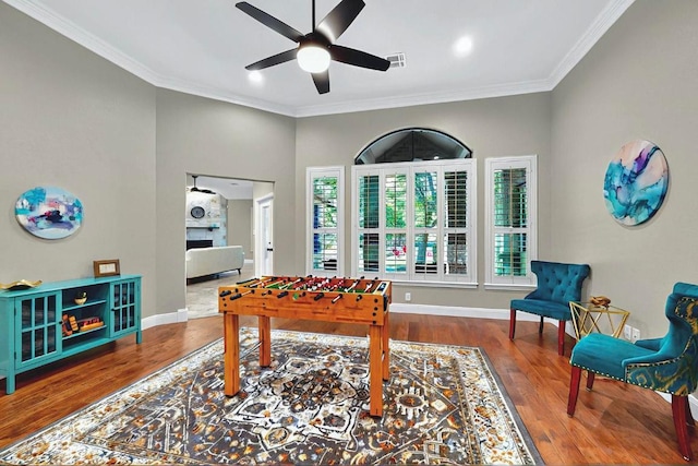 104 Standing Oak Dr, Georgetown, TX 78633 - game room with ceiling fan, wood finished floors, crown molding, baseboards, and recessed lighting