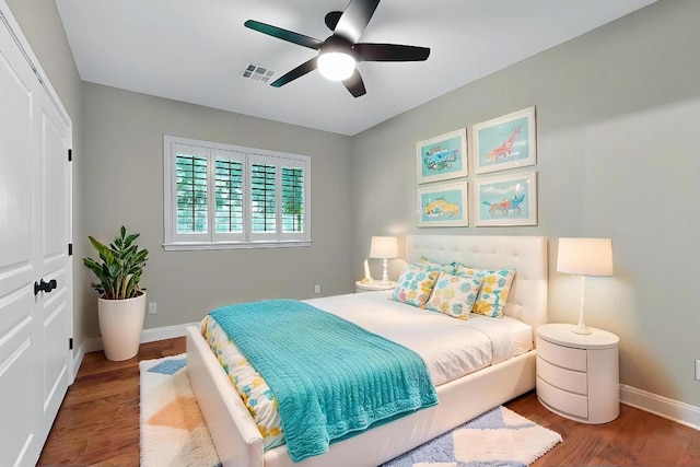 104 Standing Oak Dr, Georgetown, TX 78633 - bedroom featuring wood finished floors and a ceiling fan