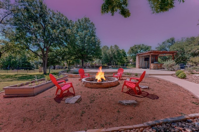 104 Standing Oak Dr, Georgetown, TX 78633 - view of yard featuring an outdoor fire pit and a pergola