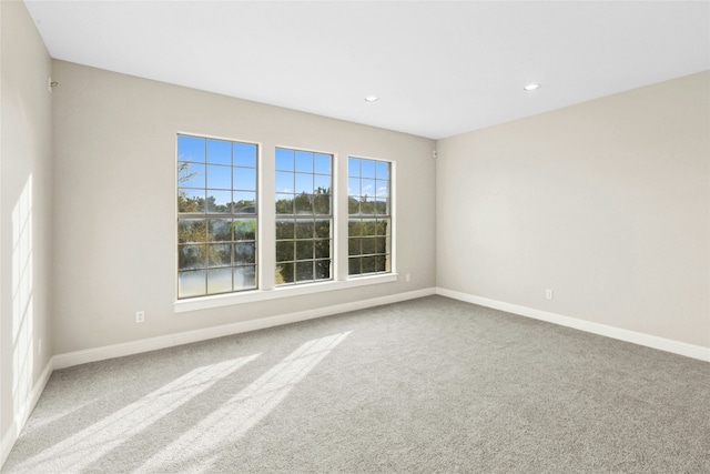 1420 Mirador, Leander, TX 78641 - carpeted spare room with baseboards and recessed lighting