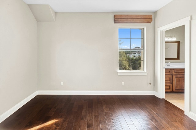 1420 Mirador, Leander, TX 78641 - unfurnished bedroom featuring dark wood finished floors and ensuite bathroom
