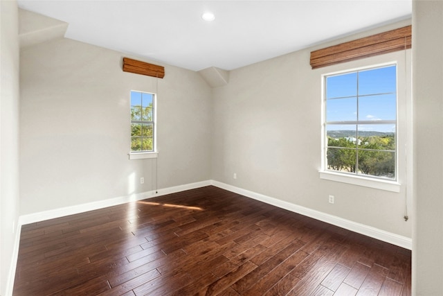 1420 Mirador, Leander, TX 78641 - unfurnished room with dark wood finished floors, baseboards, and recessed lighting