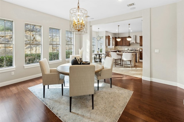 1420 Mirador, Leander, TX 78641 - dining room with plenty of natural light, a chandelier, baseboards, and recessed lighting