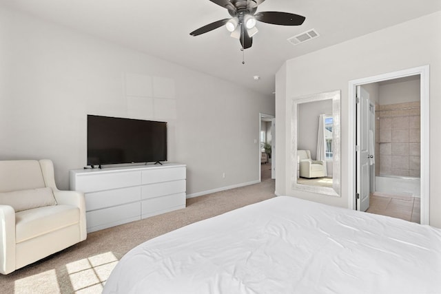 217 Timber Brook Dr, Hutto, TX 78634 - carpeted bedroom featuring connected bathroom and a ceiling fan