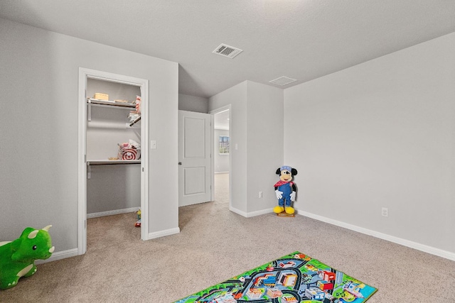 217 Timber Brook Dr, Hutto, TX 78634 - recreation room featuring carpet flooring and baseboards