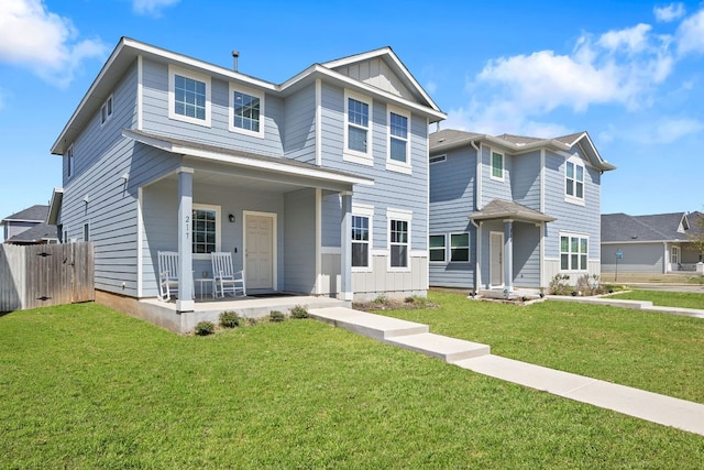 217 Timber Brook Dr, Hutto, TX 78634 - traditional-style home featuring covered porch and board and batten siding