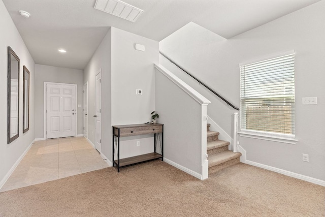 217 Timber Brook Dr, Hutto, TX 78634 - foyer with light colored carpet, stairway, and recessed lighting
