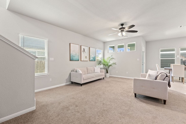 217 Timber Brook Dr, Hutto, TX 78634 - living room with light colored carpet and a ceiling fan