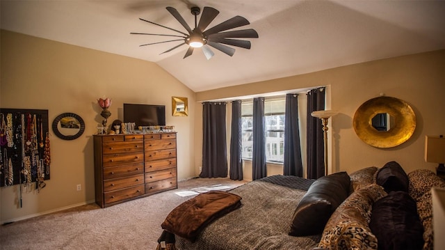 carpeted bedroom with lofted ceiling, ceiling fan, and baseboards