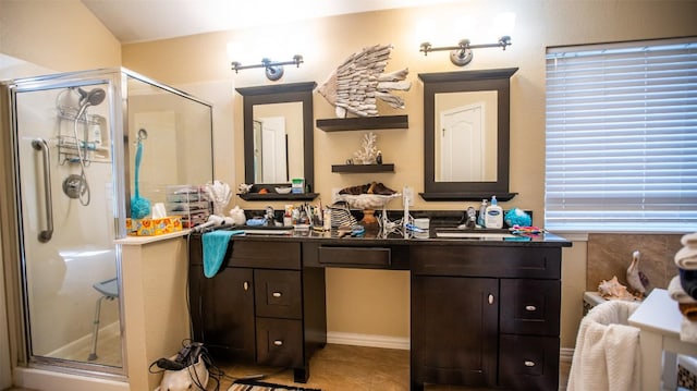 14811 Bescott Dr, Austin, TX 78728 - full bathroom with a stall shower, double vanity, and tile patterned floors