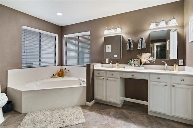 5014 Little Valley Rd, Leander, TX 78641 - full bath with double vanity, a garden tub, and tile patterned flooring