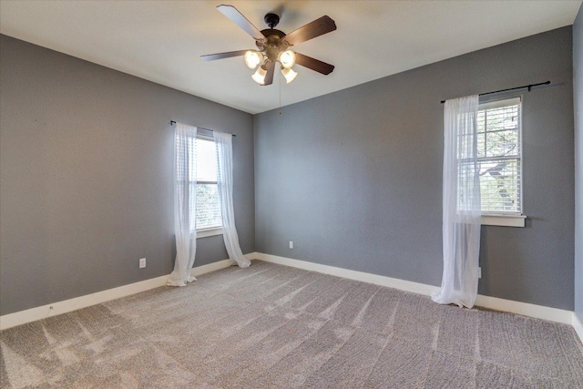 10242 Brangus Rd, Driftwood, TX 78619 - unfurnished room with plenty of natural light, ceiling fan, and light carpet