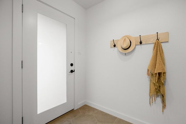 3503 Gable Dr, Austin, TX 78759 - doorway to outside with light tile patterned floors and baseboards
