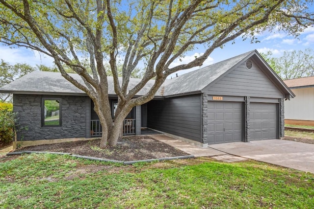 3503 Gable Dr, Austin, TX 78759 - ranch-style home with stone siding and an attached garage