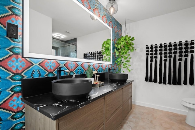 3503 Gable Dr, Austin, TX 78759 - full bathroom with double vanity and a shower with door