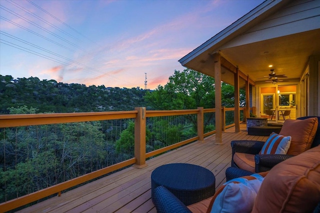 1607 Bay Hill Dr, Austin, TX 78746 - deck at dusk with a ceiling fan