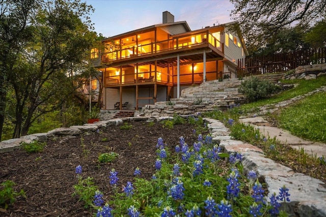 1607 Bay Hill Dr, Austin, TX 78746 - rear view of house with a chimney, a deck, and a balcony