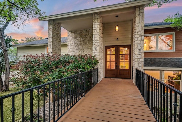 1607 Bay Hill Dr, Austin, TX 78746 - deck at dusk featuring french doors