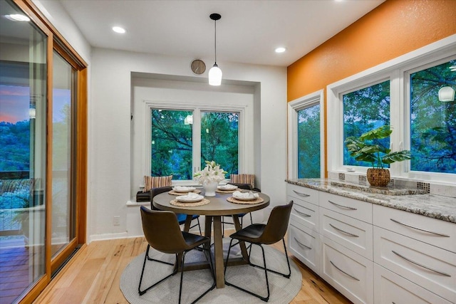 1607 Bay Hill Dr, Austin, TX 78746 - dining area featuring light wood finished floors and recessed lighting