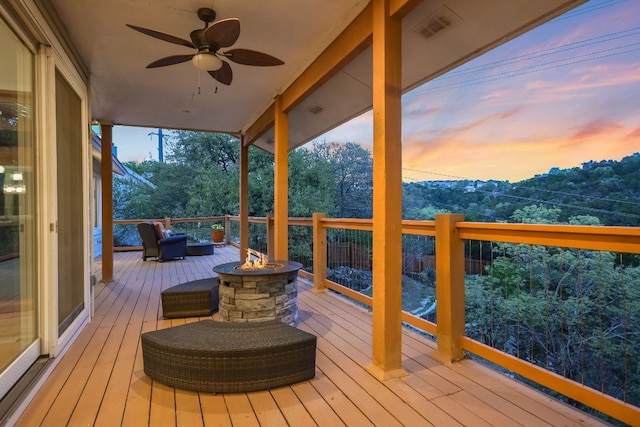 1607 Bay Hill Dr, Austin, TX 78746 - deck with a ceiling fan and an outdoor living space with a fire pit