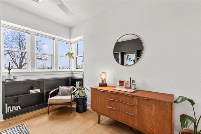 510 W 22nd St, Georgetown, TX 78626 - sitting room featuring light wood-style flooring, ceiling fan, and baseboards