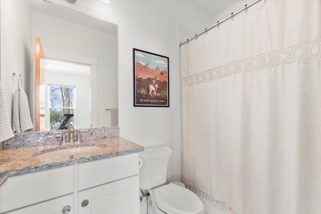 510 W 22nd St, Georgetown, TX 78626 - bathroom with toilet, vanity, and a shower with shower curtain
