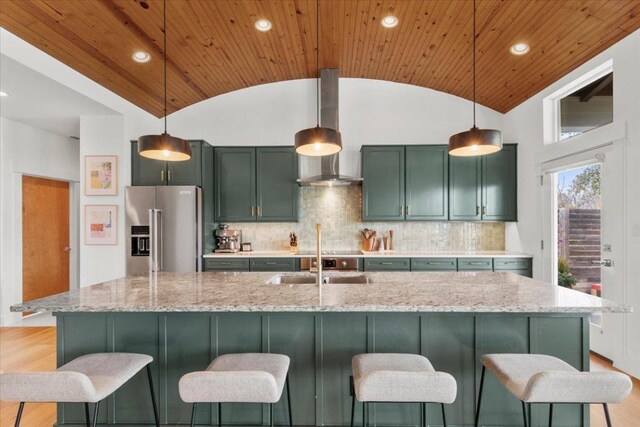 510 W 22nd St, Georgetown, TX 78626 - kitchen with green cabinets, high quality fridge, wooden ceiling, vaulted ceiling, and a sink