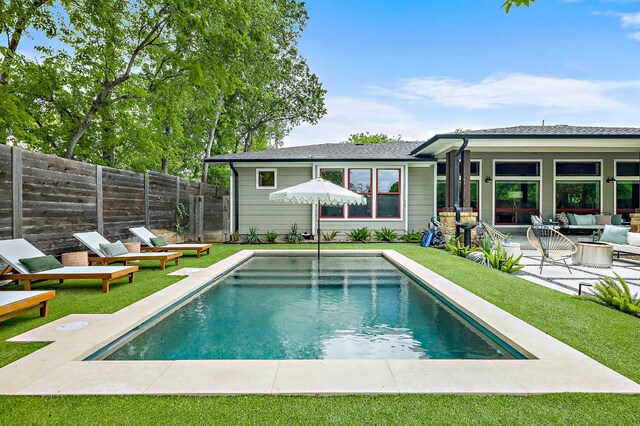 510 W 22nd St, Georgetown, TX 78626 - back of property featuring outdoor lounge area and a patio area
