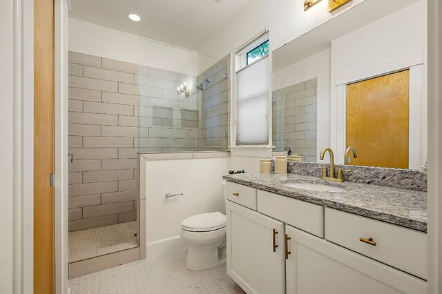 510 W 22nd St, Georgetown, TX 78626 - full bath with walk in shower, toilet, tile patterned floors, vanity, and recessed lighting