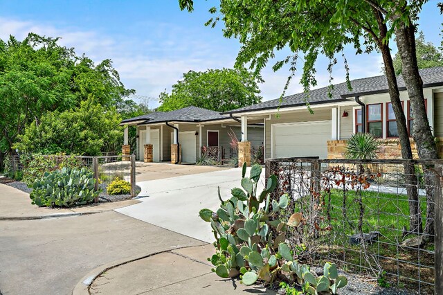 510 W 22nd St, Georgetown, TX 78626 - ranch-style home featuring an attached garage, fence, and driveway