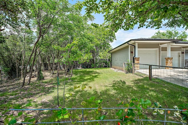 510 W 22nd St, Georgetown, TX 78626 - view of yard with an attached garage