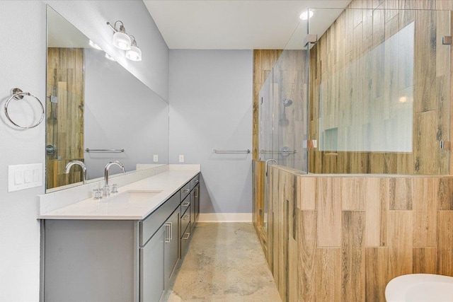 1811 Cedar Ave, Austin, TX 78702 - bathroom featuring a stall shower, vanity, and baseboards