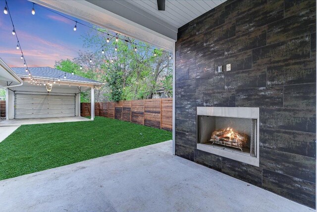1811 Cedar Ave, Austin, TX 78702 - view of patio / terrace with a large fireplace