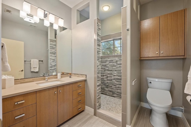 101 Knarr St, Austin, TX 78734 - full bathroom with vanity, walk in shower, and wood finished floors
