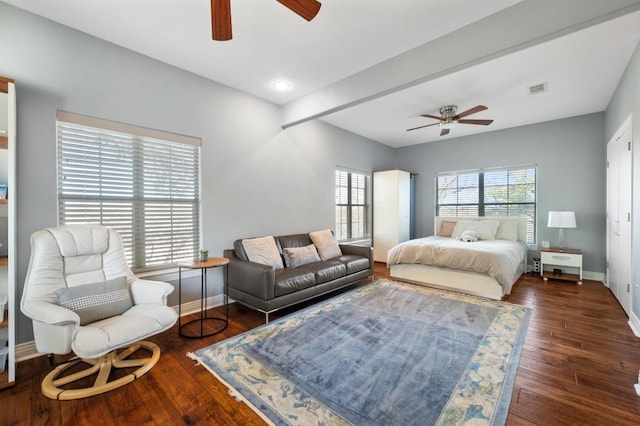 101 Knarr St, Austin, TX 78734 - bedroom featuring wood finished floors, a ceiling fan, and beam ceiling