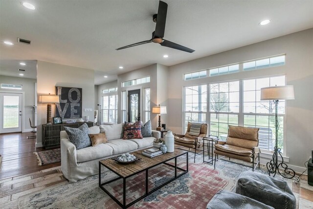 18190 Round Hall Rd, Holland, TX 76534 - living room featuring visible vents, recessed lighting, a ceiling fan, and wood finished floors