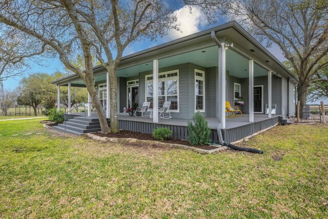 18190 Round Hall Rd, Holland, TX 76534 - view of front of house with covered porch and a front lawn